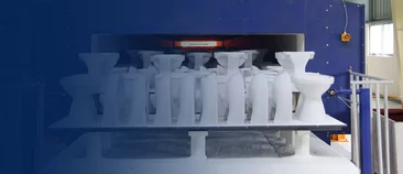  Header image of ceramic industry consisting of sanitary elements on a kiln car for ceramic firing