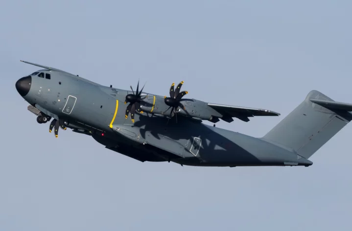  Military transport aircraft in flight against a blue sky