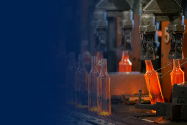 Glass industry header image consisting of hot glass handling 