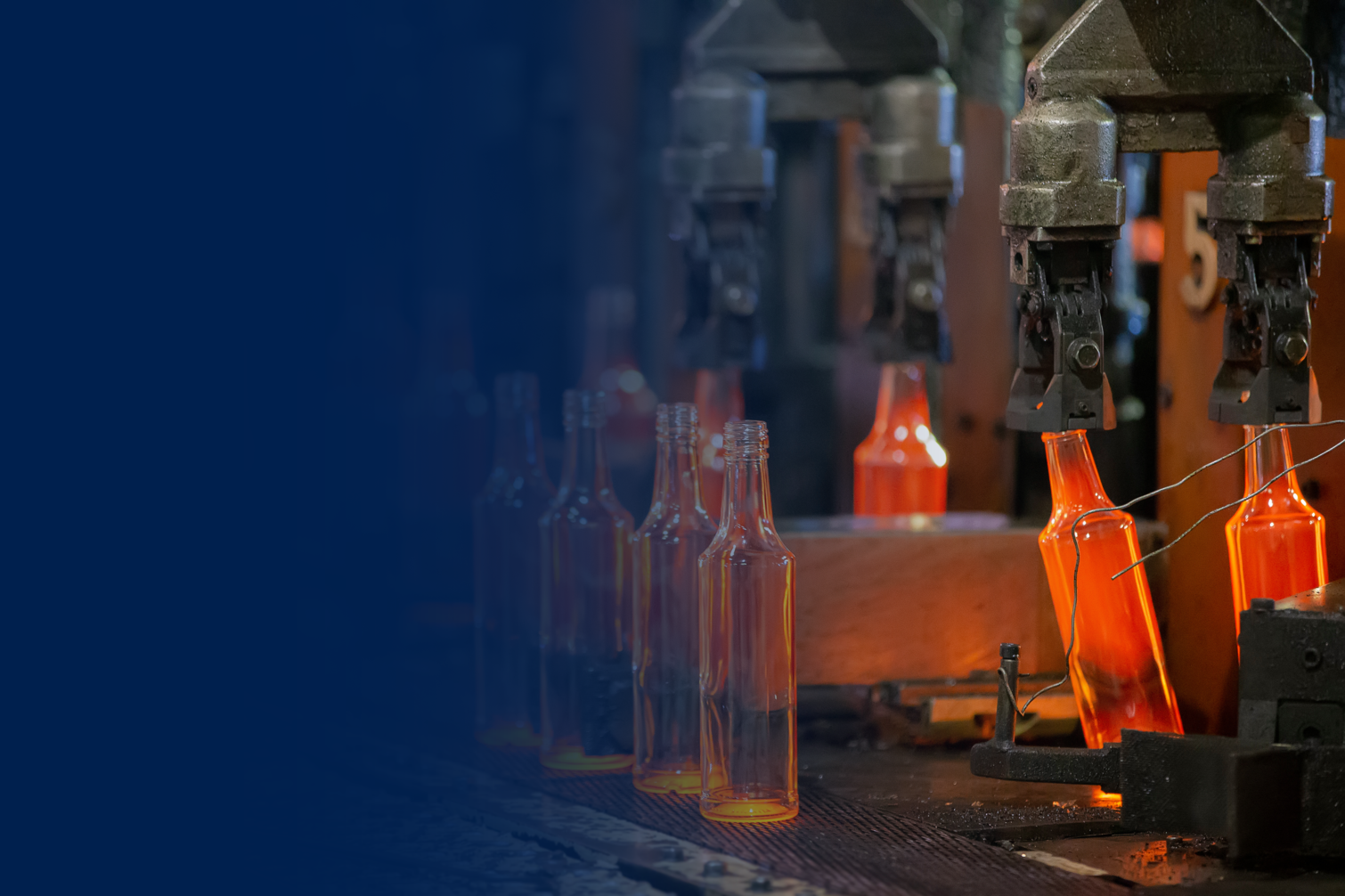 Glass industry header image consisting of hot glass handling 