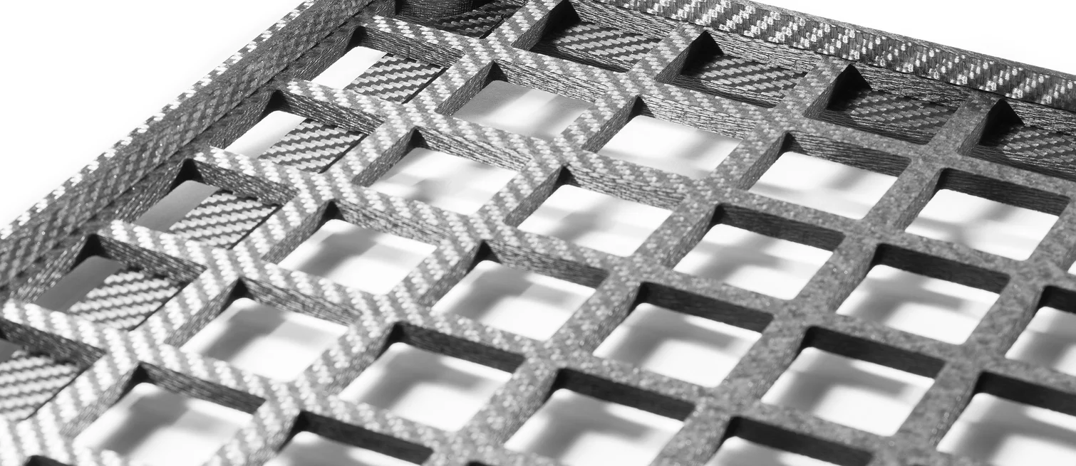  Technical grid structure made of carbon fiber reinforced carbon (CFC) with square pattern geometry for thermal processing applications.
