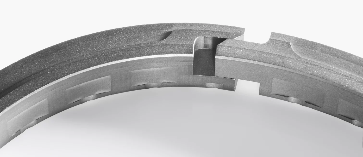  Precisely manufactured segmented ring with interlocking feature for use in sealing systems or rotating industrial equipment.