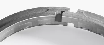  Precisely manufactured segmented ring with interlocking feature for use in sealing systems or rotating industrial equipment.
