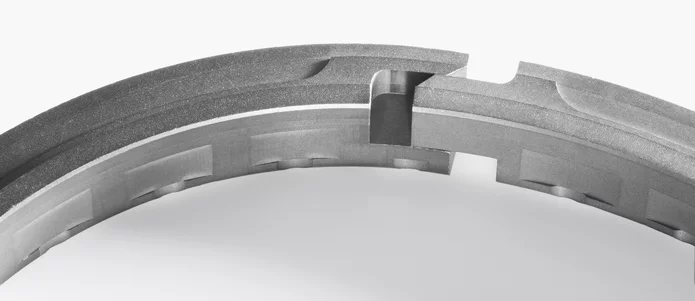  Precisely manufactured segmented ring with interlocking feature for use in sealing systems or rotating industrial equipment.
