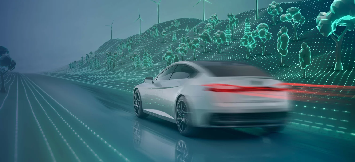    Modernes Elektroauto fährt durch futuristischer Umgebung.