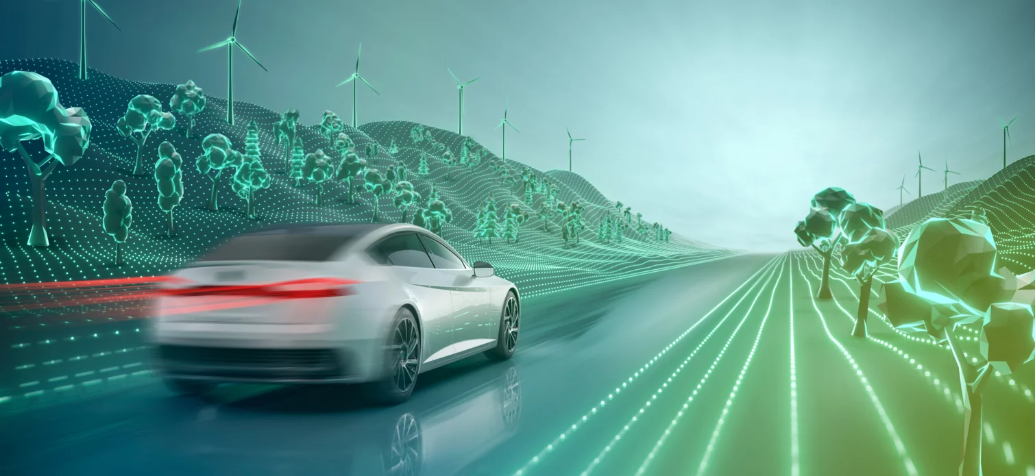 Modernes Elektroauto fährt durch futuristische Umgebung.