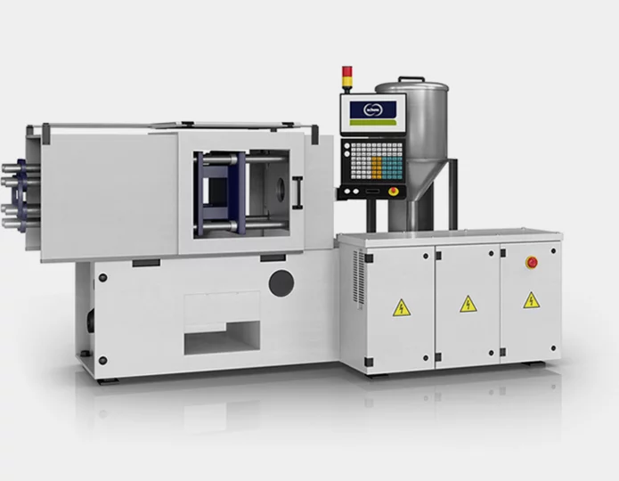  Modern injection moulding machine with control unit, feed hopper and safety housing, suitable for industrial plastics and metal processing.
