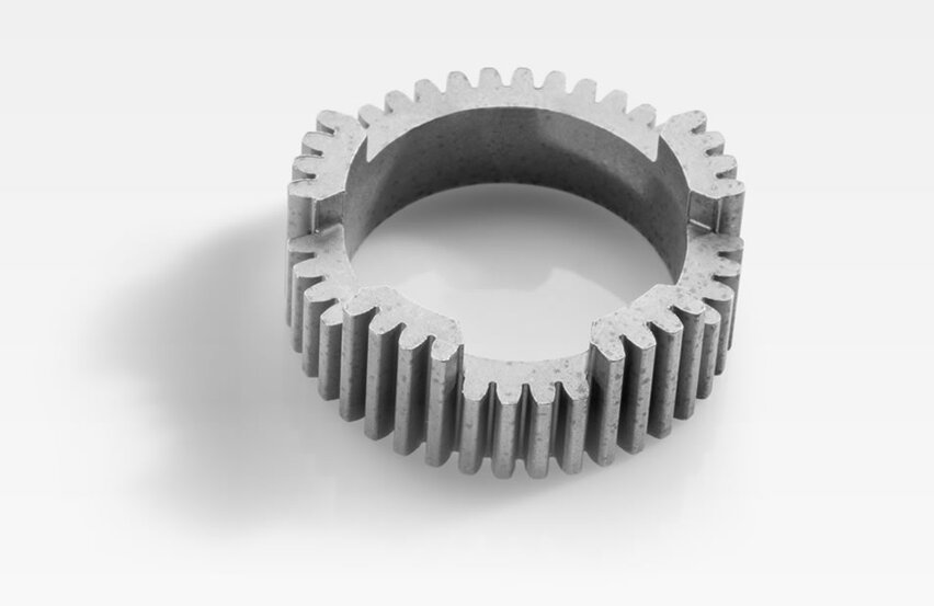 Output gear for the worm drive of an electric mirror adjuster