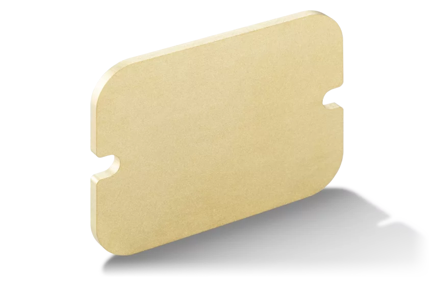 Beige Platte mit abgerundeten Ecken und Einkerbungen, vor transparentem Hintergrund