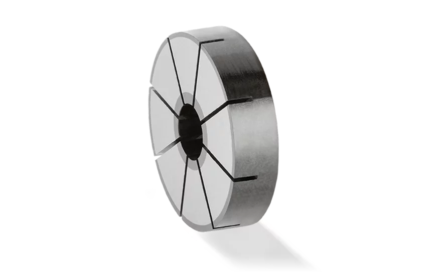  Carbon disc with segmented structure and central hole, shown against a transparent background.