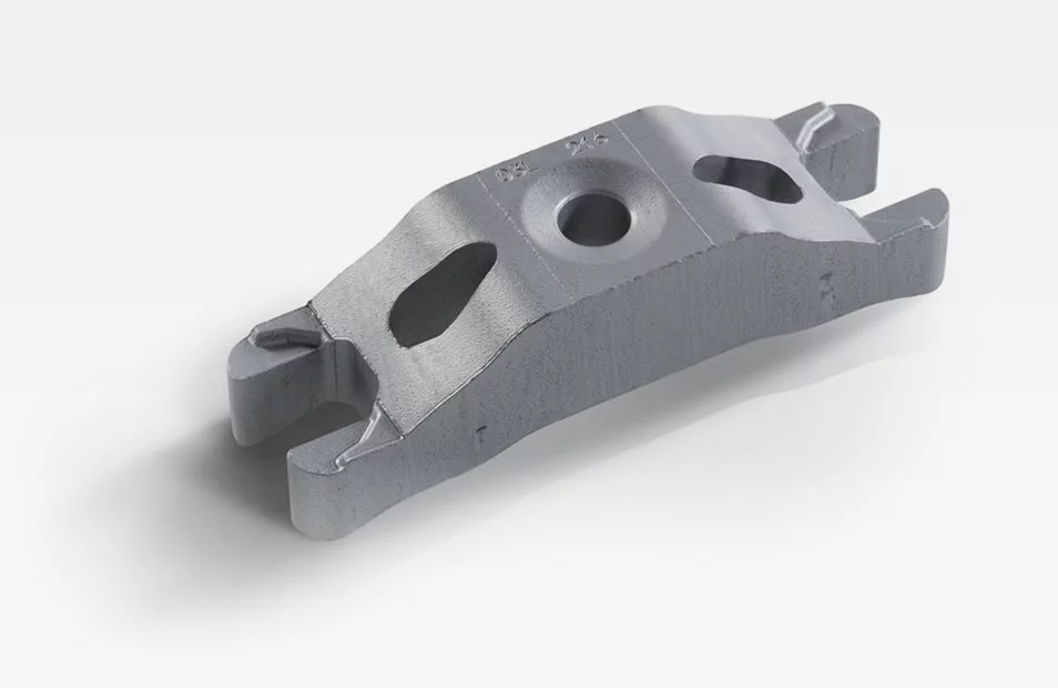 Injector holder in the area of the injection sytem - made of sintered metal for weight reduction