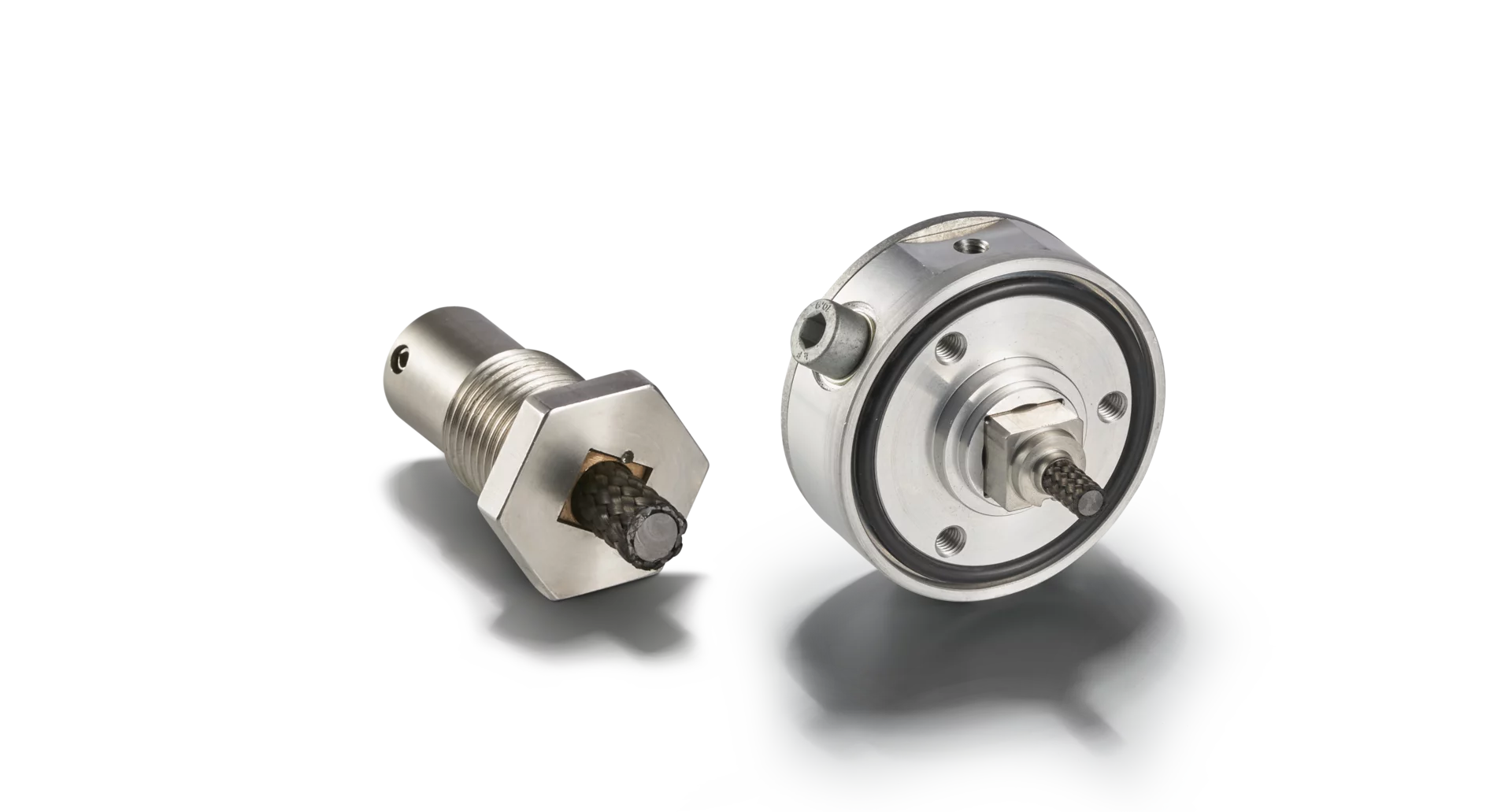   Motor side shaft grounding system for railroad applications