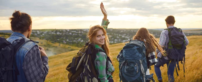  A group of work colleagues is on a hiking trip in nature