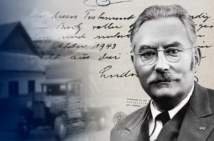  Portrait of Ludwig Schunk in front of historic company building and old documents